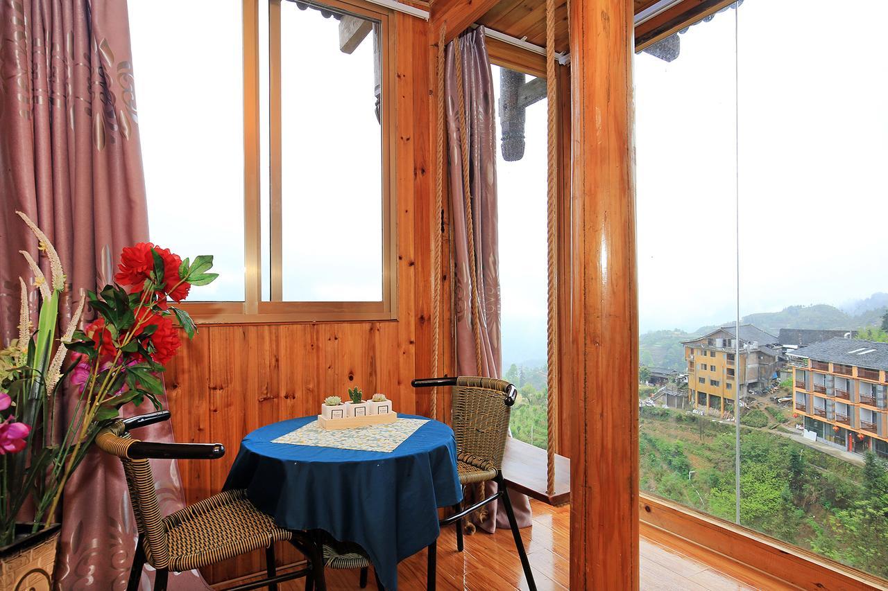 Wanjinglou Guest House لونغشينغ المظهر الخارجي الصورة
