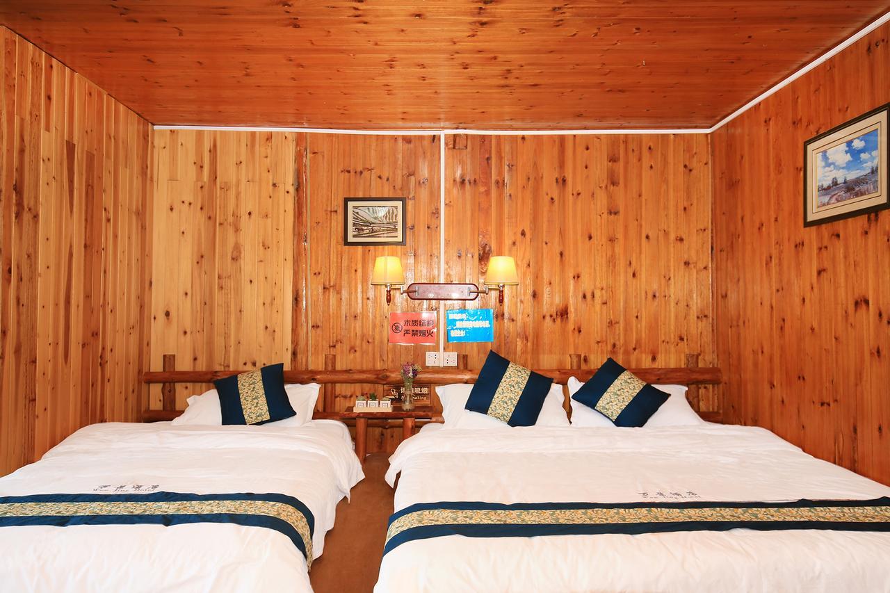 Wanjinglou Guest House لونغشينغ المظهر الخارجي الصورة