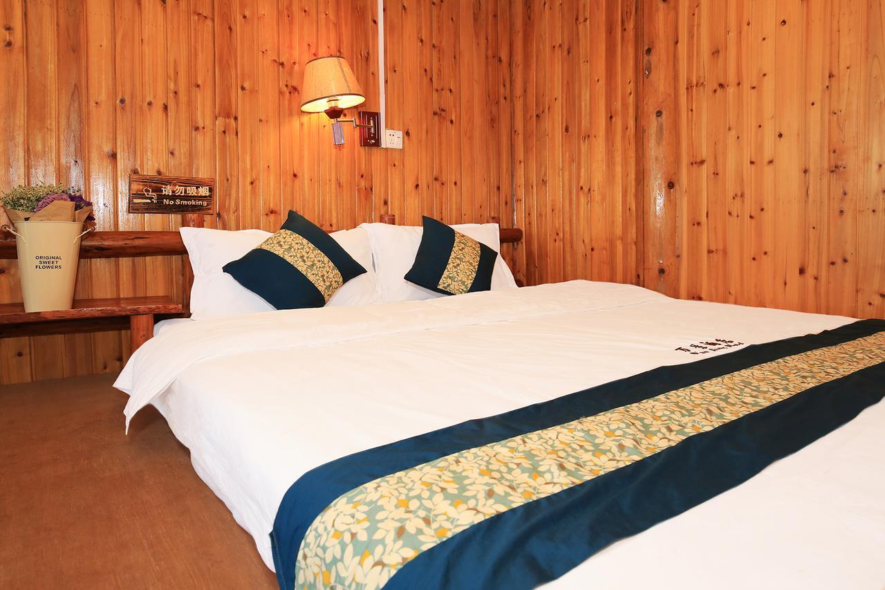Wanjinglou Guest House لونغشينغ المظهر الخارجي الصورة