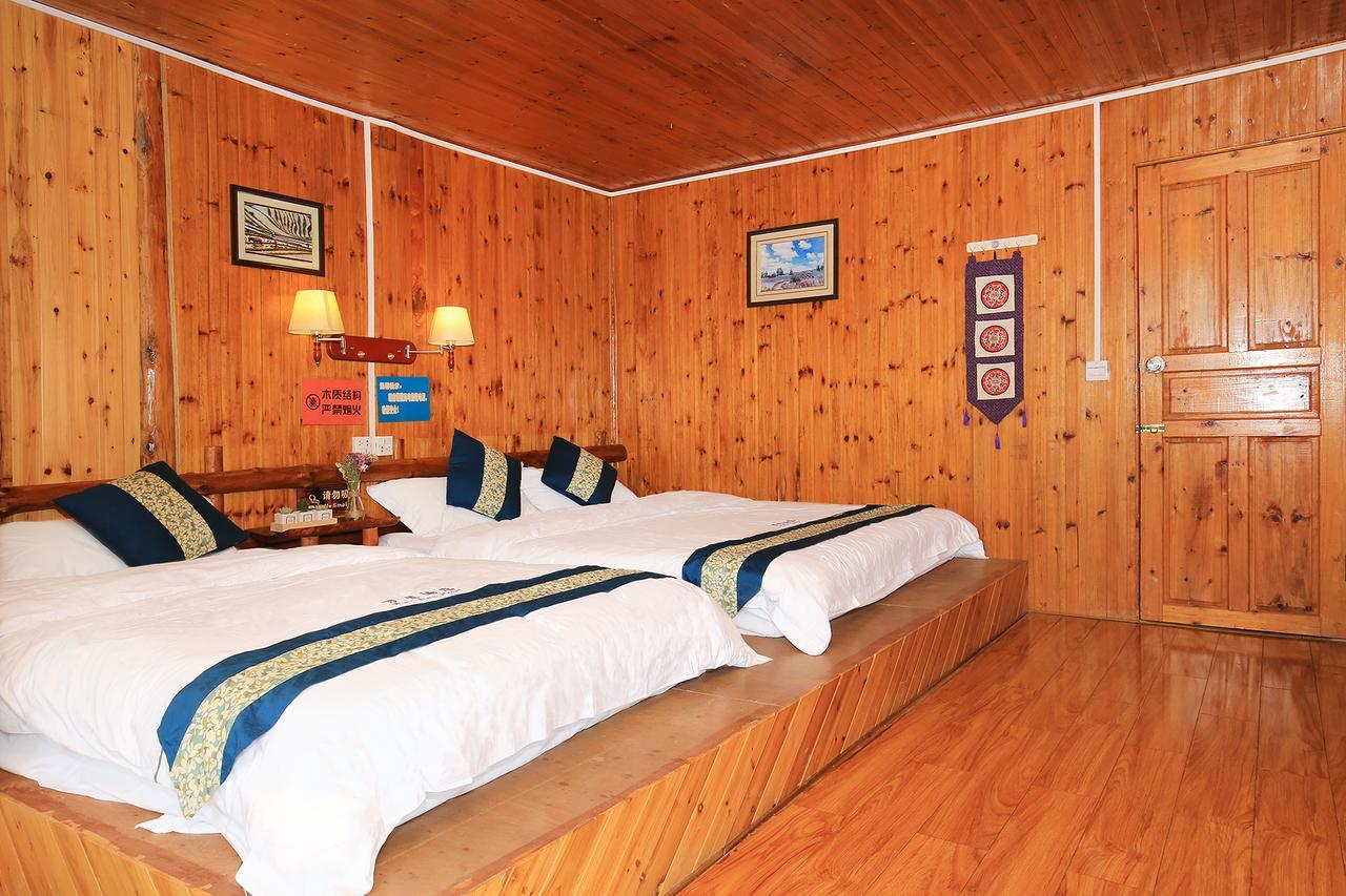 Wanjinglou Guest House لونغشينغ المظهر الخارجي الصورة