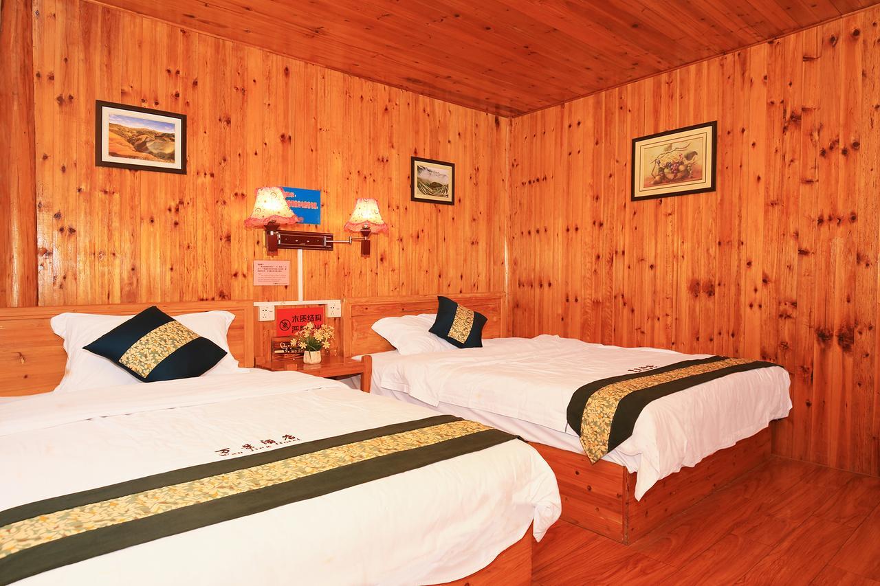 Wanjinglou Guest House لونغشينغ المظهر الخارجي الصورة