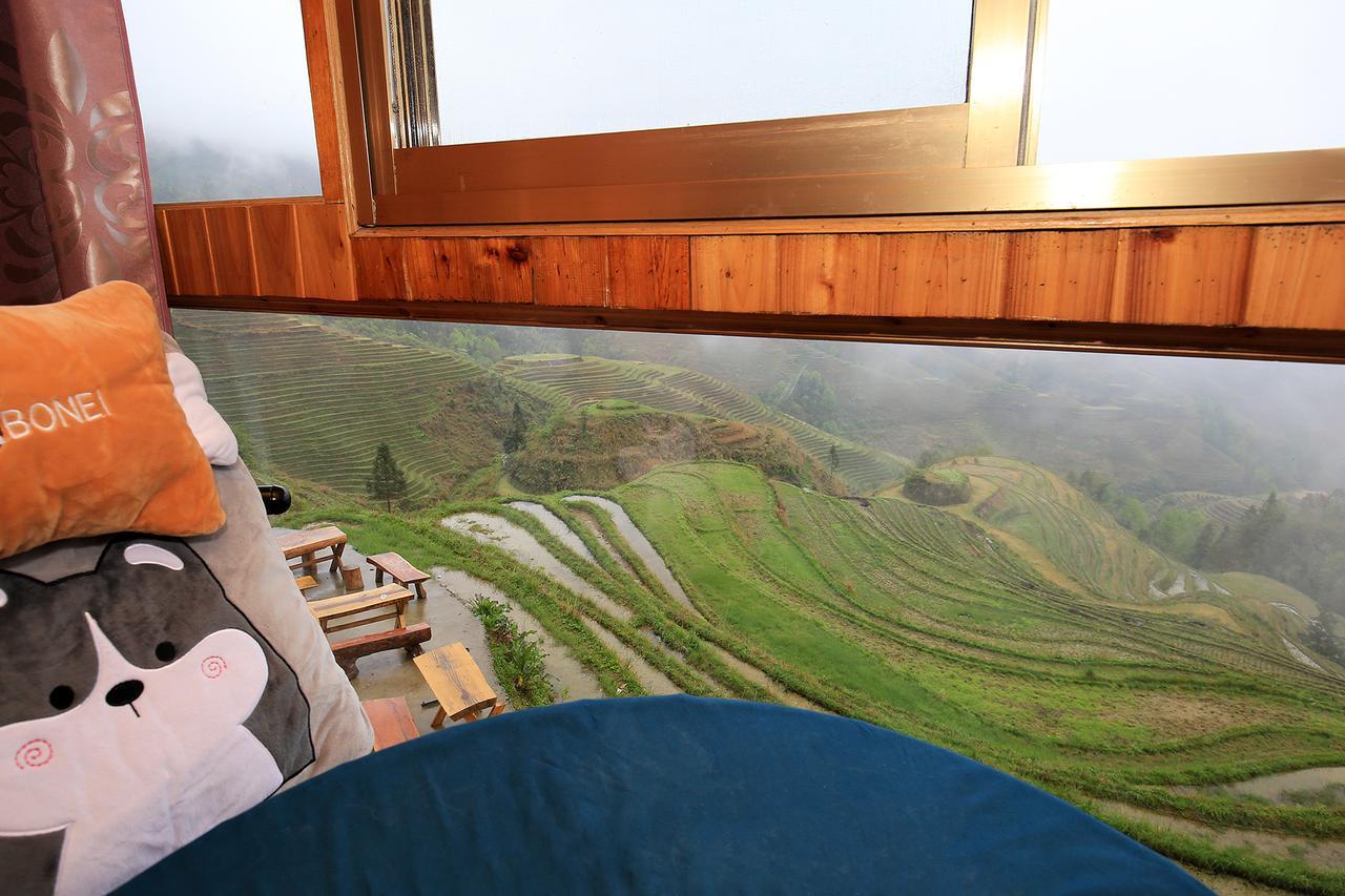 Wanjinglou Guest House لونغشينغ المظهر الخارجي الصورة
