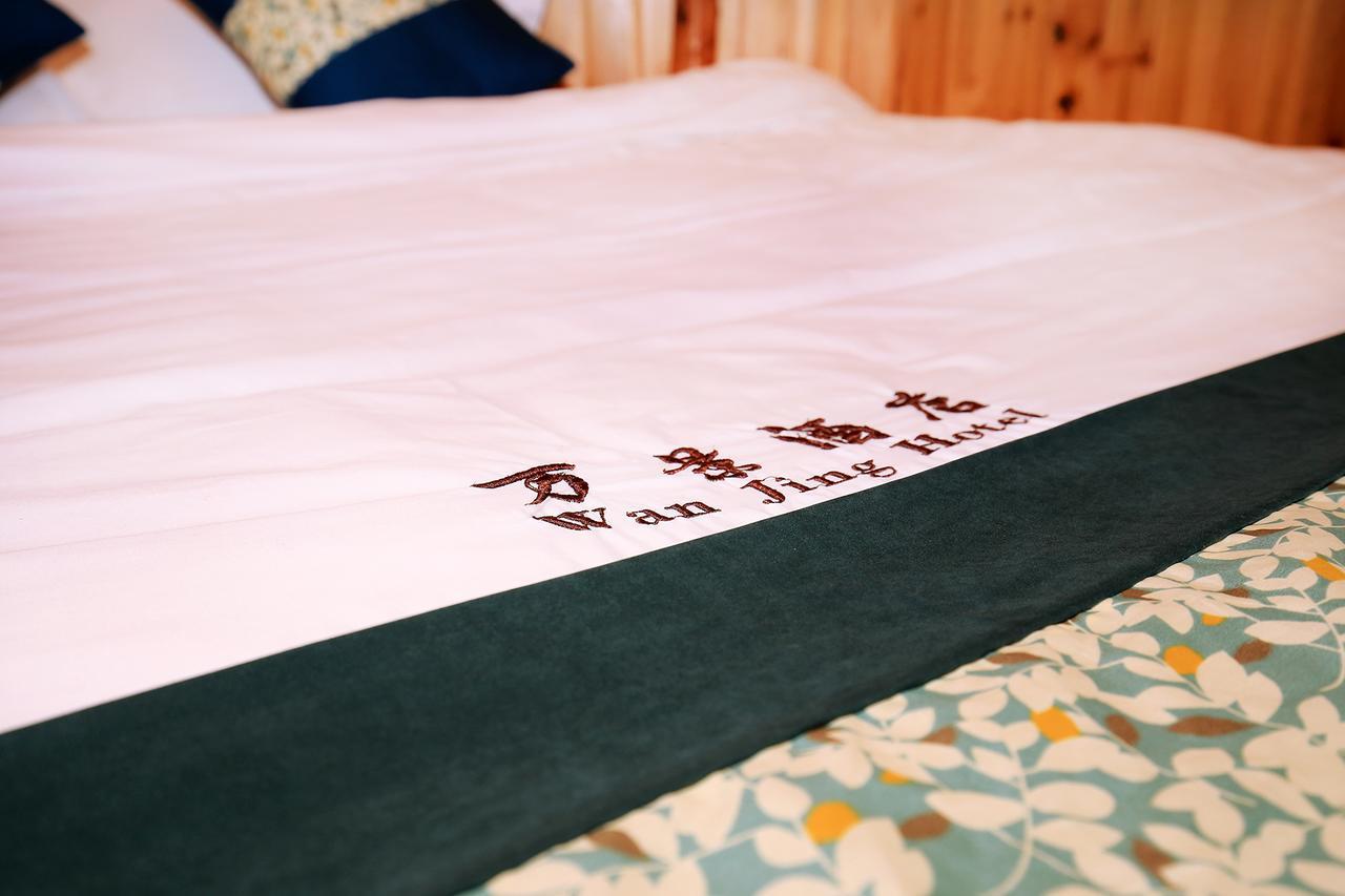 Wanjinglou Guest House لونغشينغ المظهر الخارجي الصورة