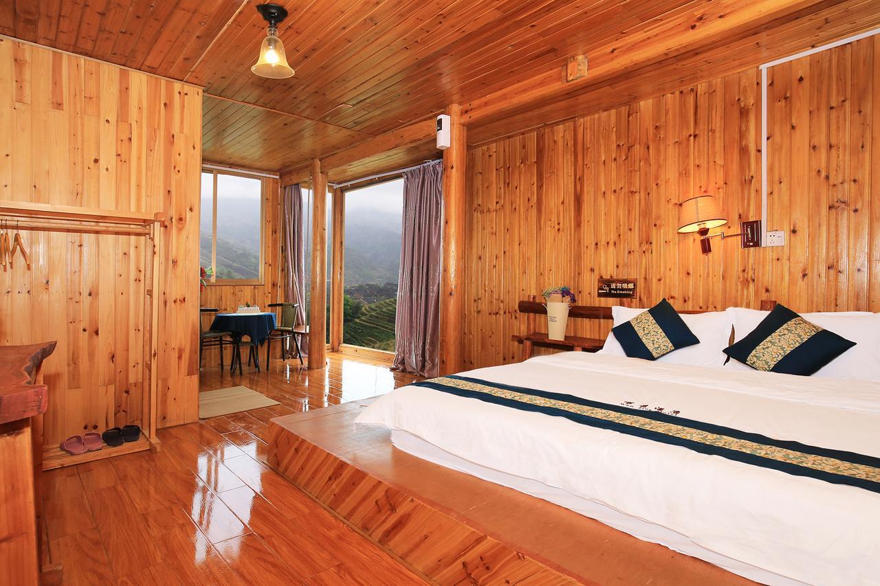 Wanjinglou Guest House لونغشينغ المظهر الخارجي الصورة