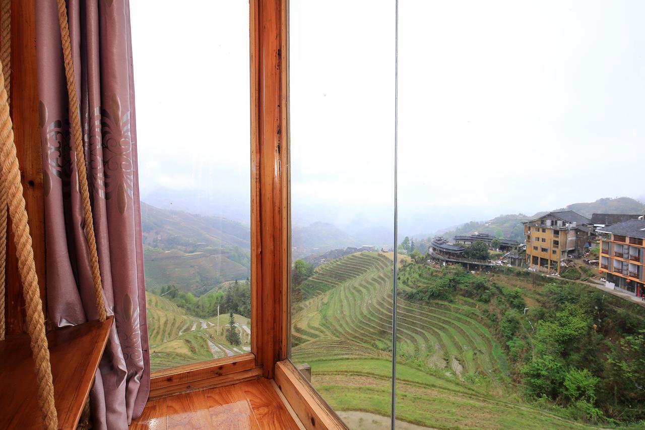 Wanjinglou Guest House لونغشينغ المظهر الخارجي الصورة
